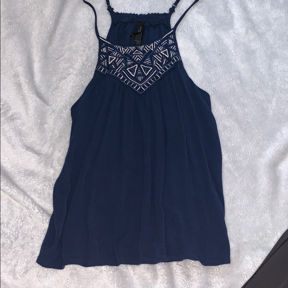 Blue shirt with design on top